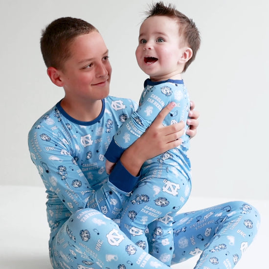 North Carolina Tar Heels bamboo baby and kids pajamas collection with zippy one-piece sleeper and two-piece pajama set