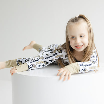 Purdue Boilermakers bamboo zippy pajamas for babies with white background and black and gold trim