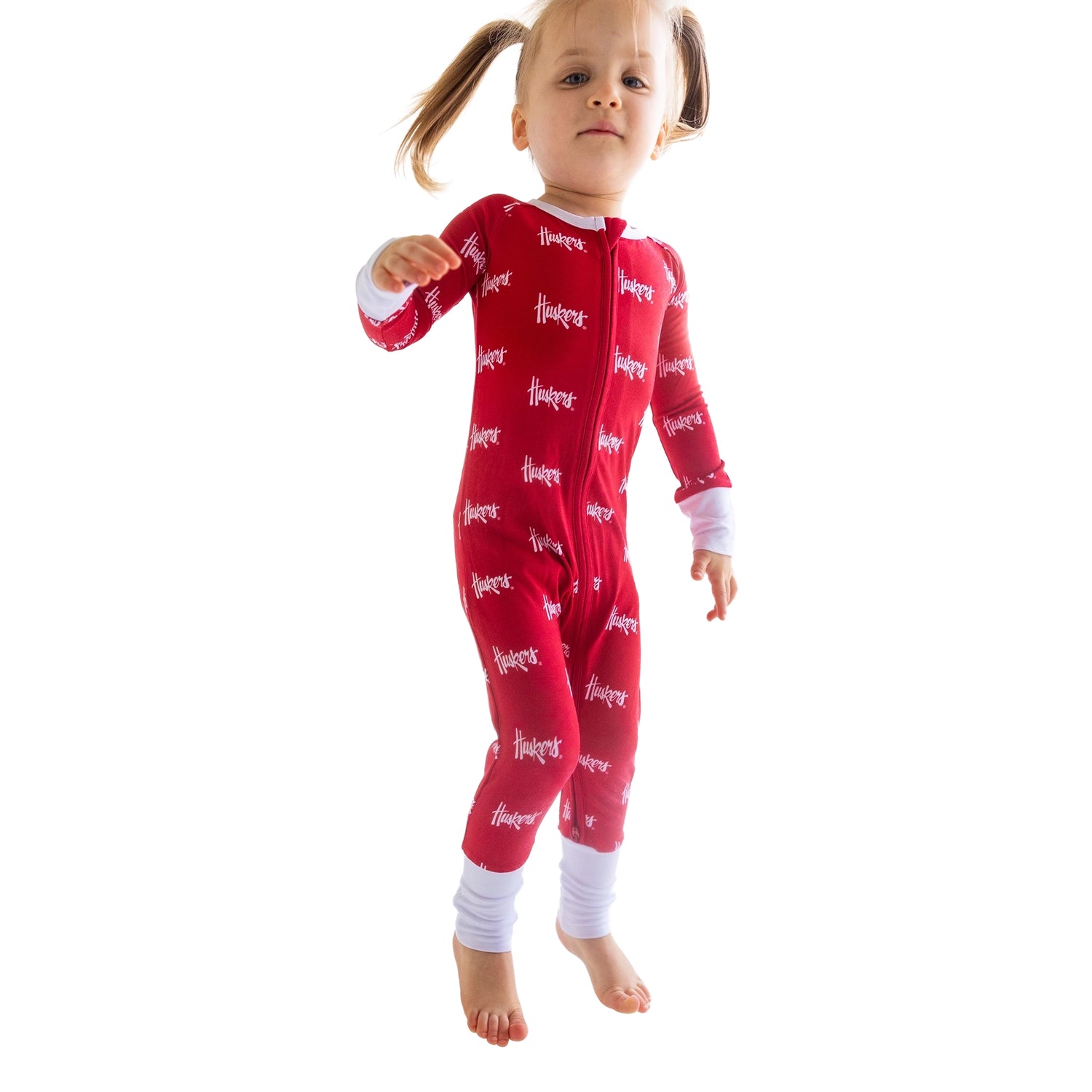 Nebraska Cornhuskers Zippy One-Piece sleeper for babies with double zipper convertible footies and official logo.