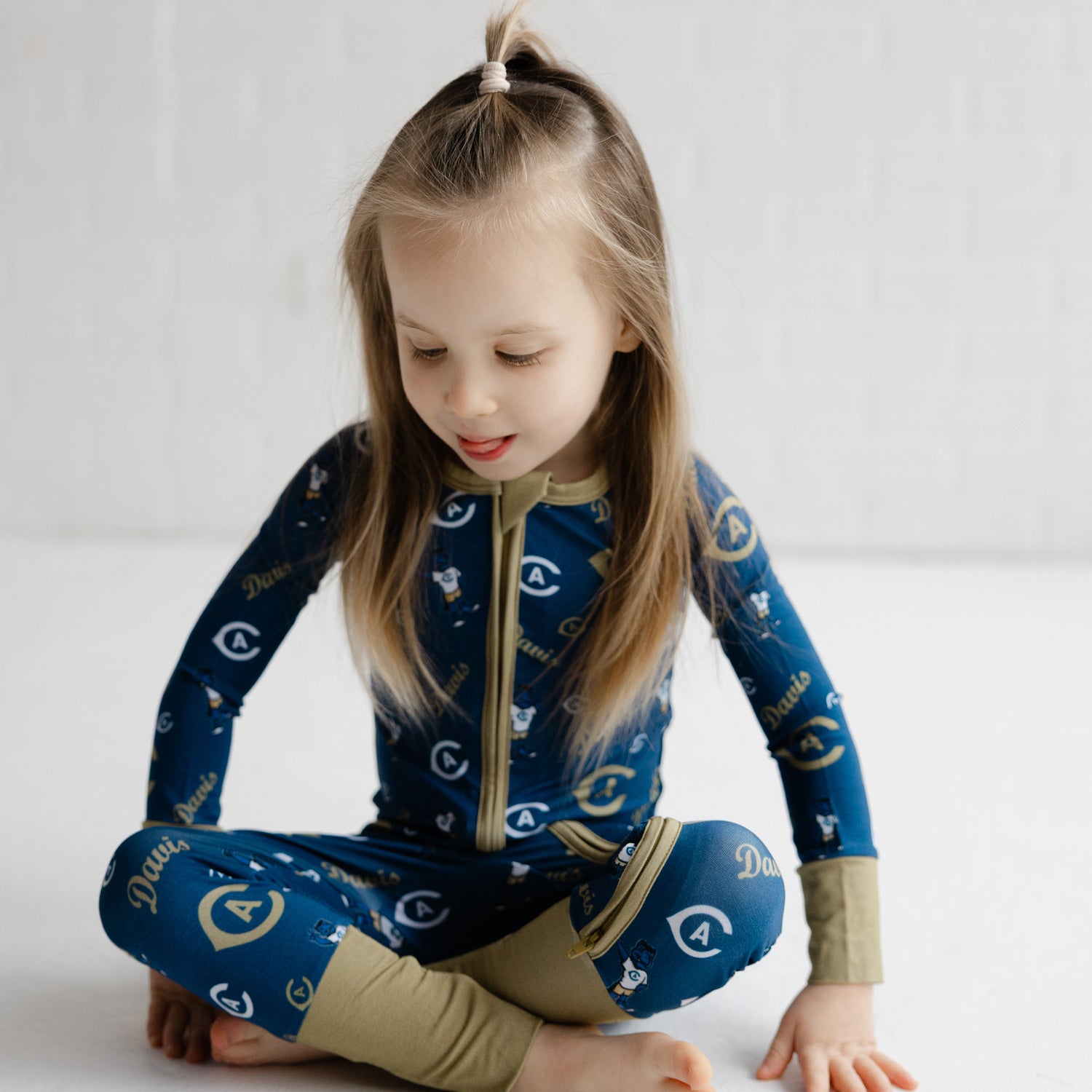 UC Davis Aggies baby zip sleeper featuring officially licensed collegiate design