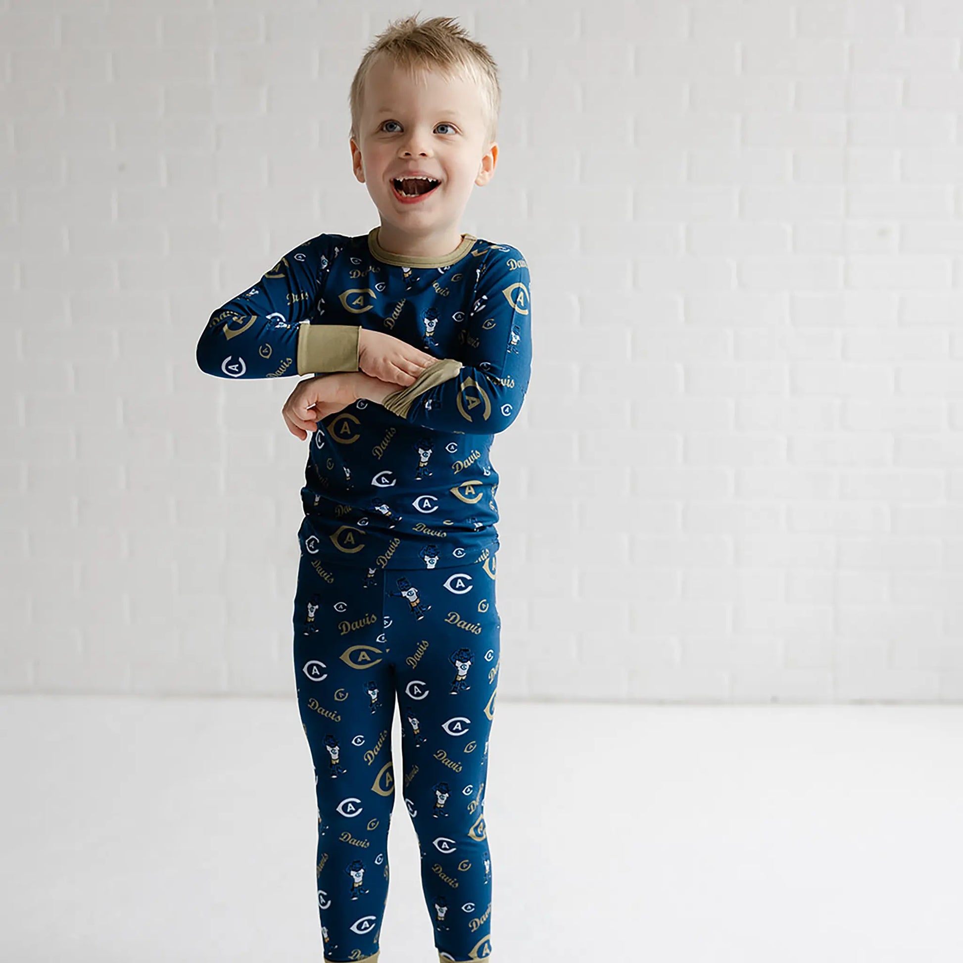 UC Davis Aggies bamboo pajama set for kids in signature blue and gold with officially licensed collegiate logos.