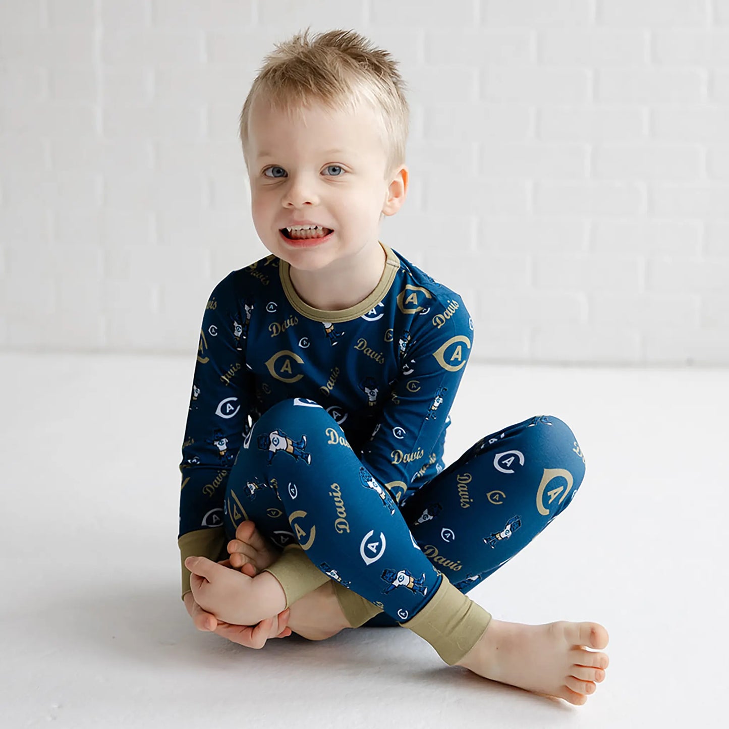 UC Davis blue and gold bamboo two piece pajamas featuring bold Aggies logos.