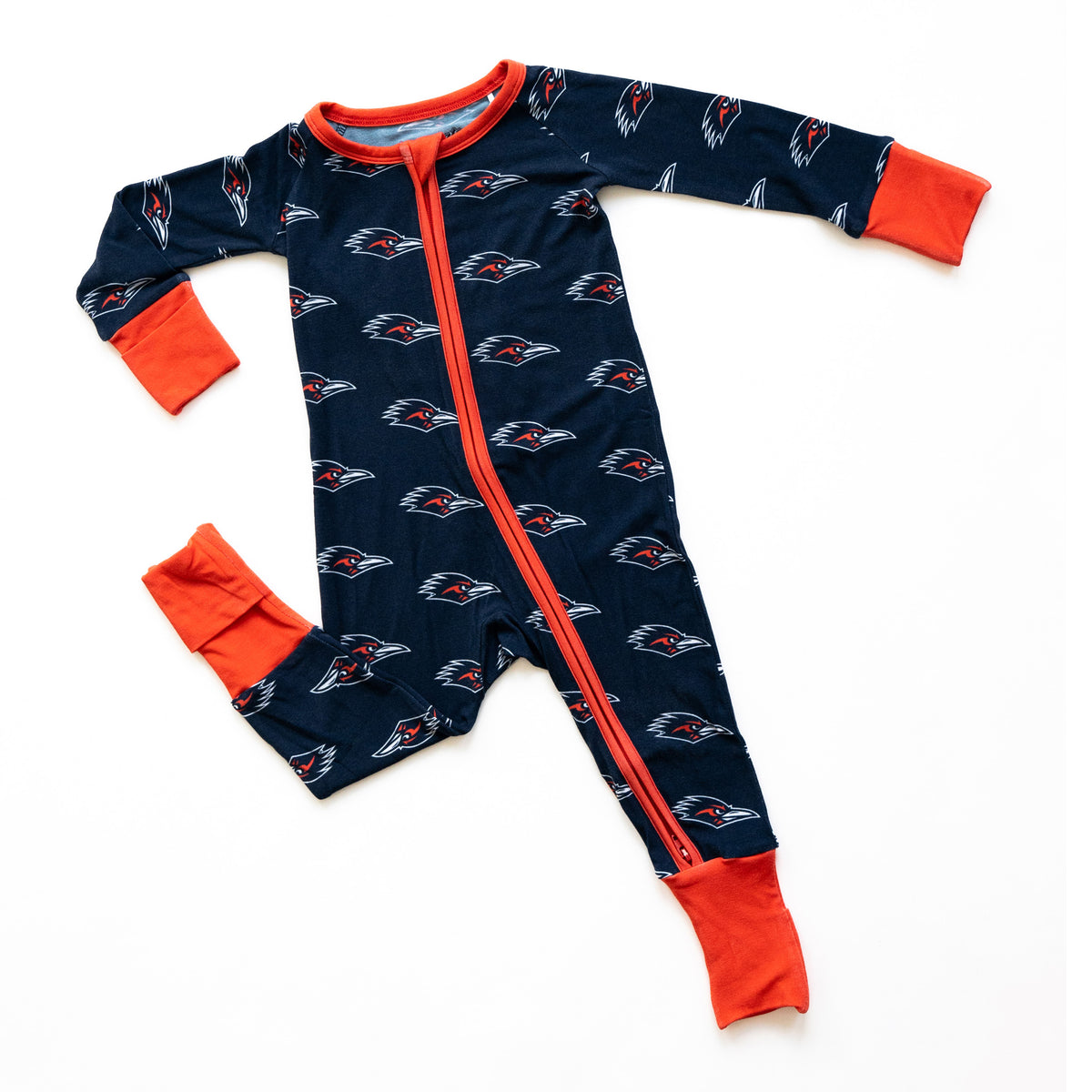 A baby long-sleeve footed sleeper UTSA roadrunners bamboo all over print.